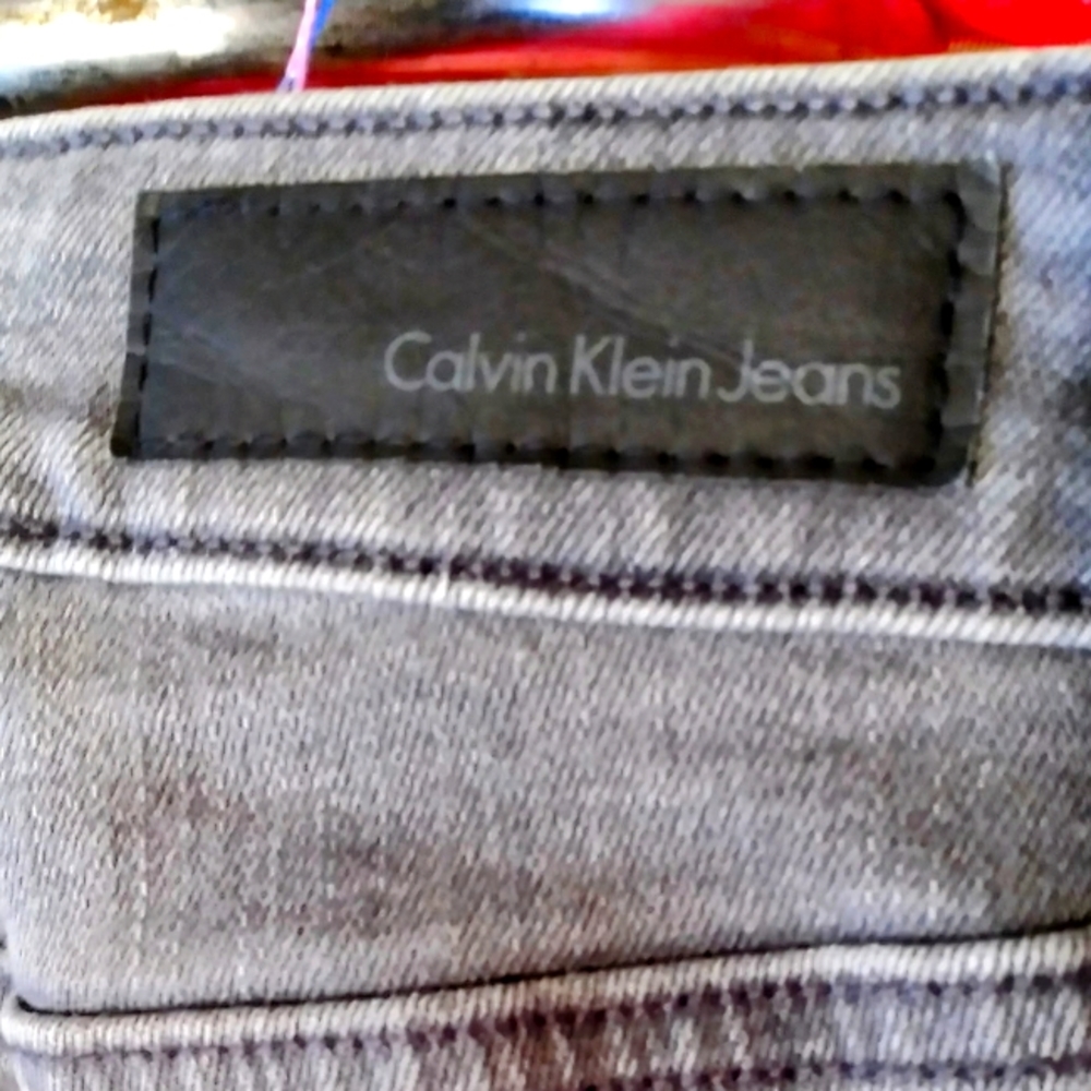 Jean: Calvin Klein Grey/Black boyfriend cut size 2